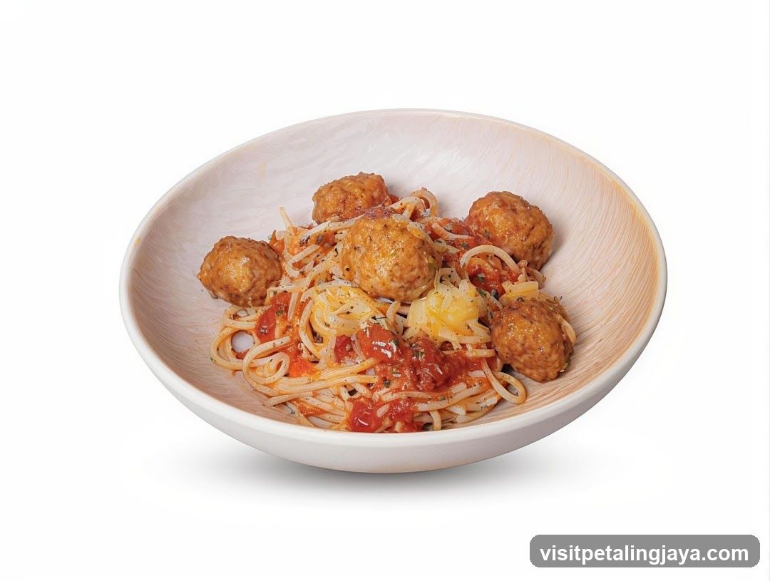 Spaghetti with Meatballs in a Wooden Bowl