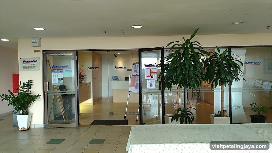 Office Entrance with Plants and Signage