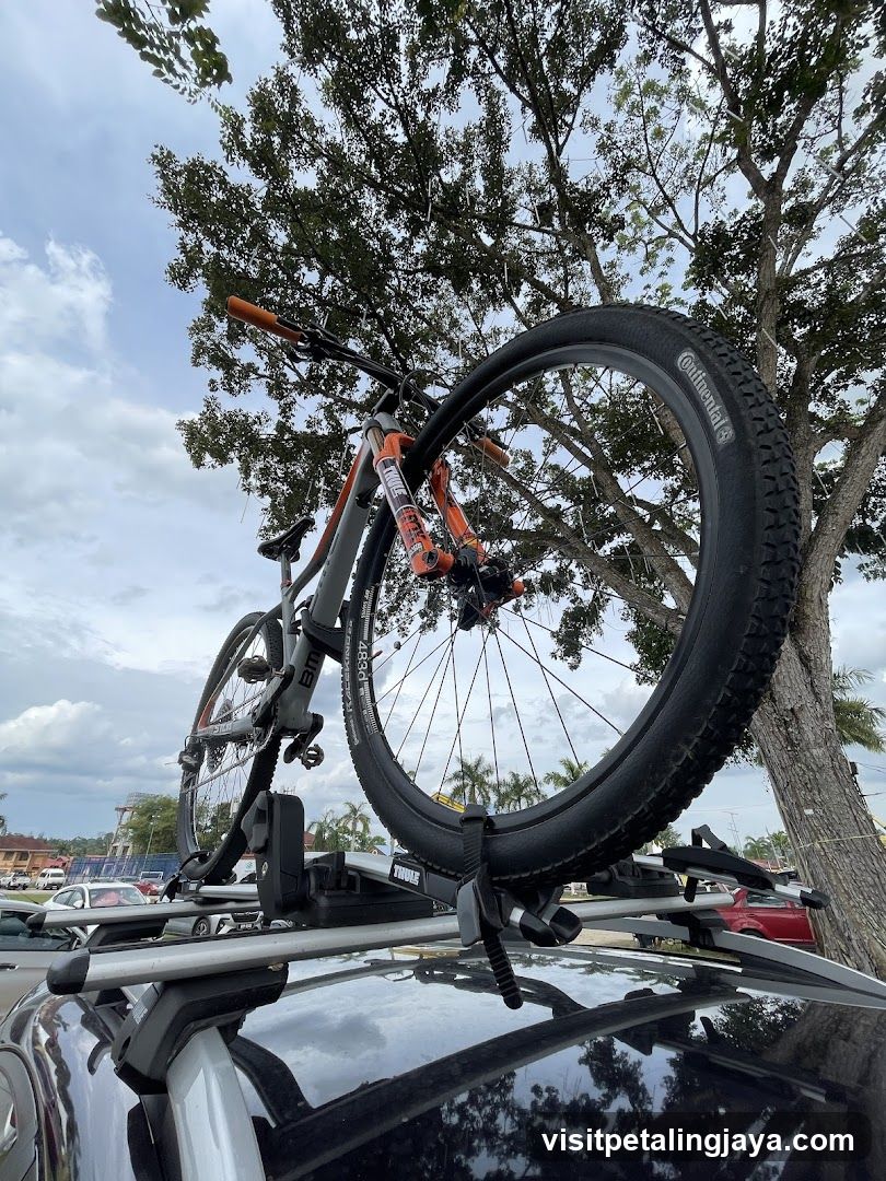 Bicycle on car roof rack