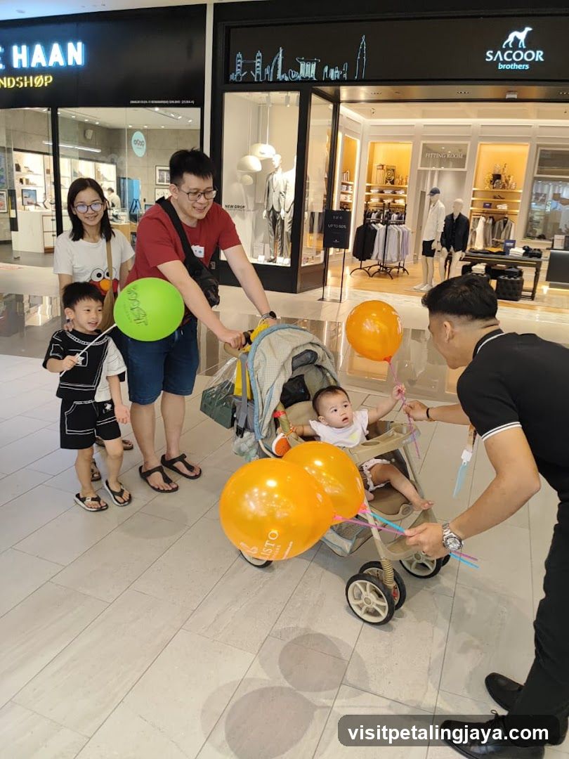 Family with baby in stroller at mall