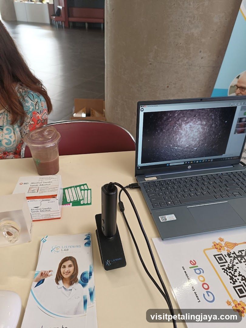 Table with laptop and alcohol wipes
