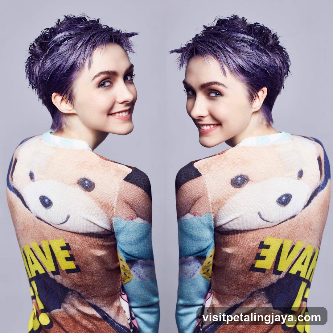 Purple-haired woman in animal print sweater