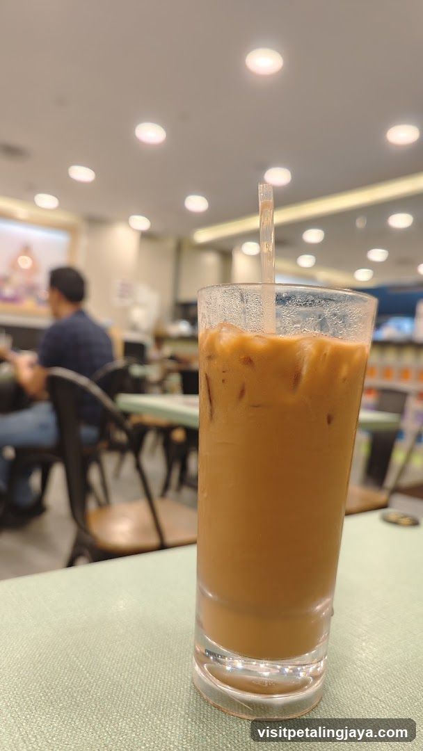 Iced beverage in café interior