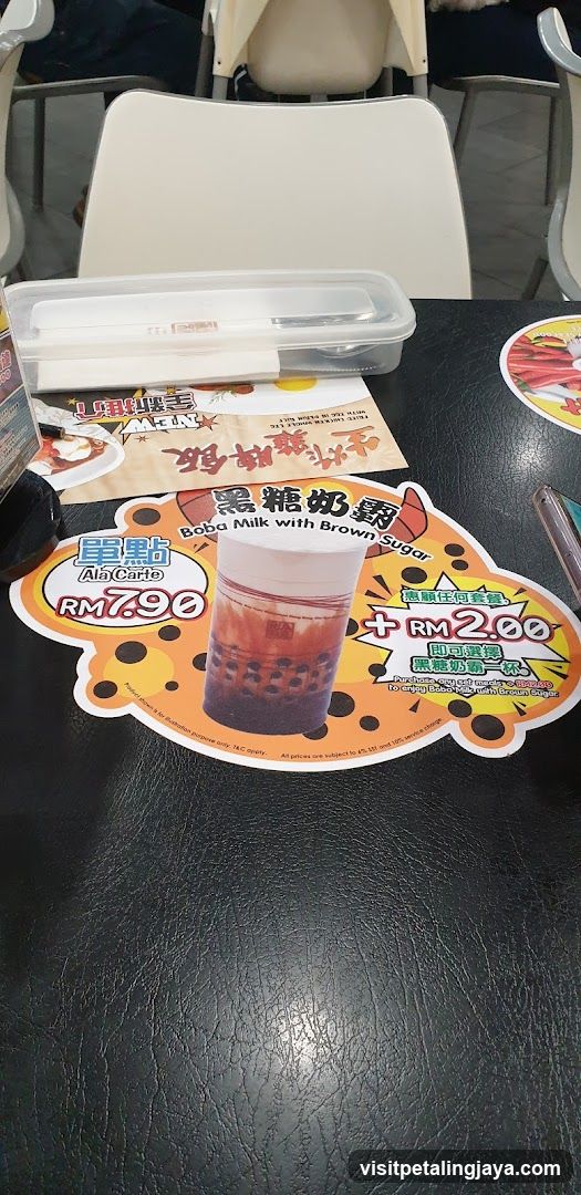 Tabletop with drink promotion sticker