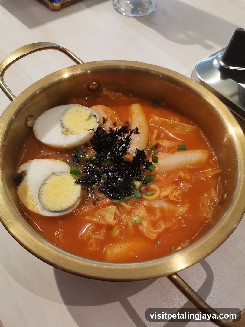 Food dish in golden pot