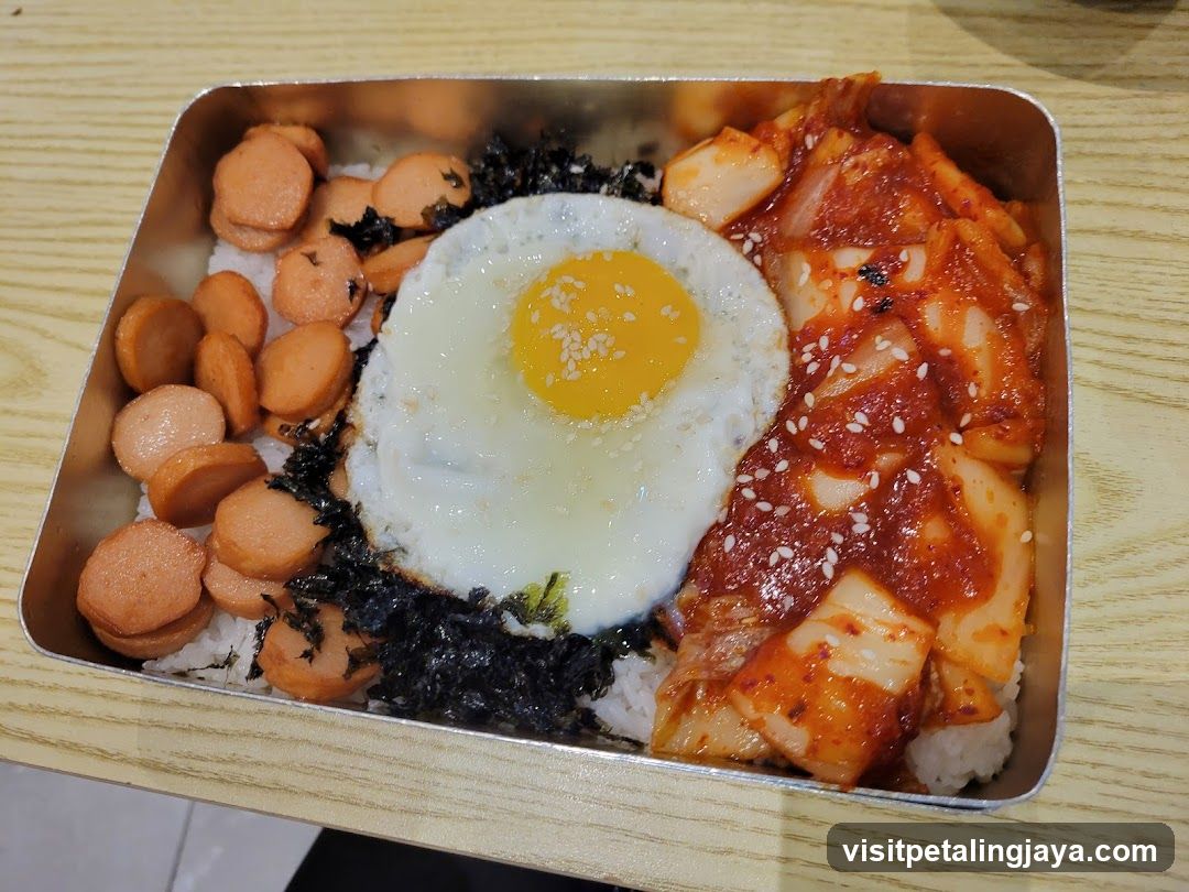 Korean-style rice bowl in metal container