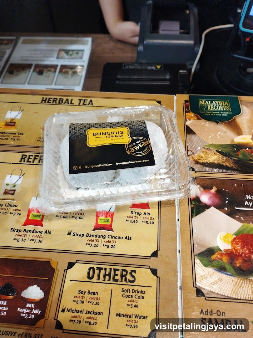 Bungkus Kawkaw Packaging on Menu Table