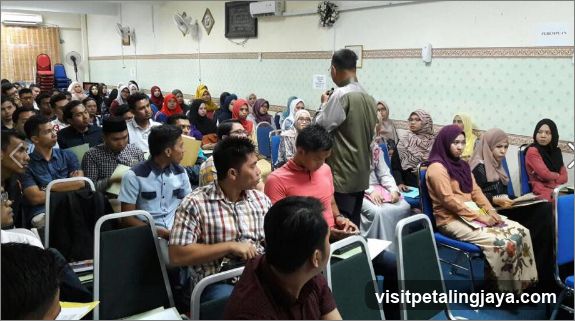Audience in a Meeting Hall