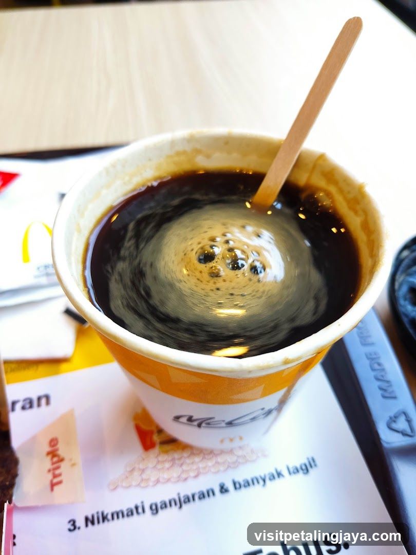 Coffee Cup with Stirring Stick