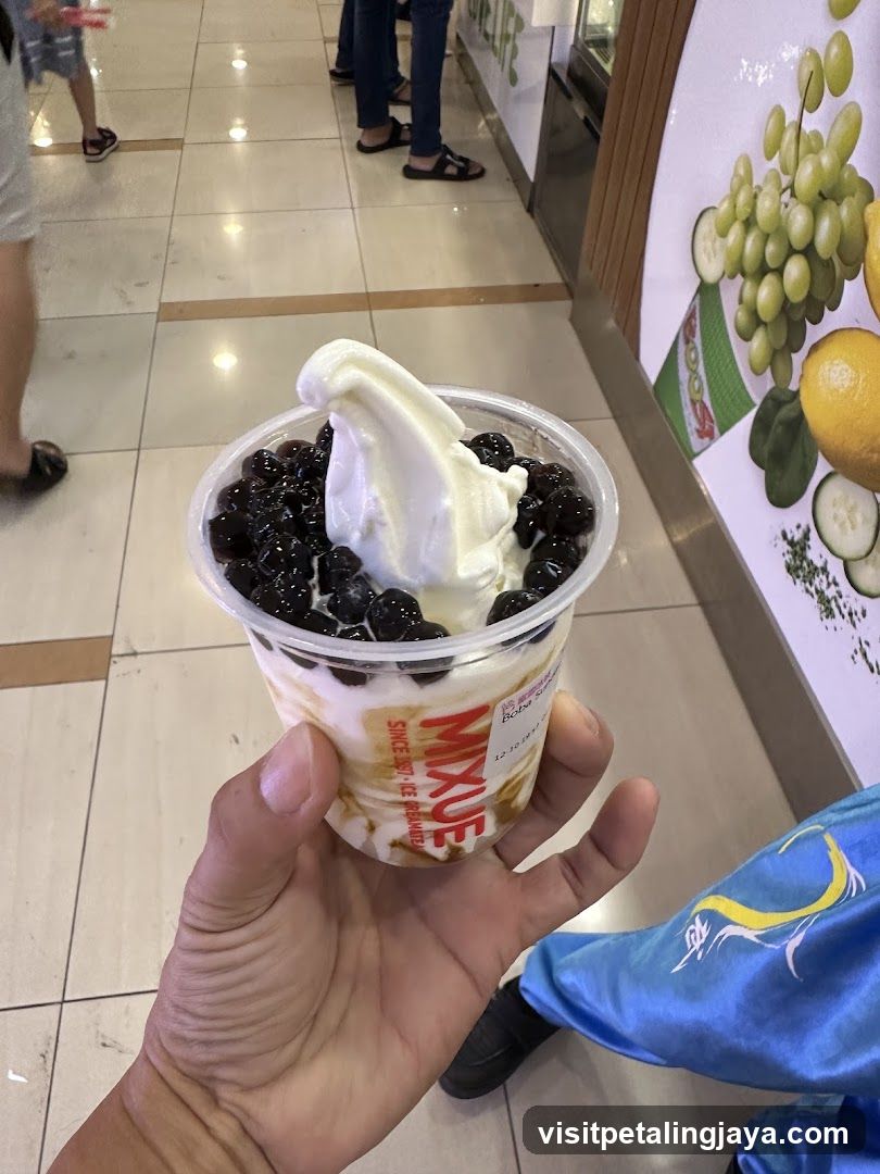 Hand holding dessert cup