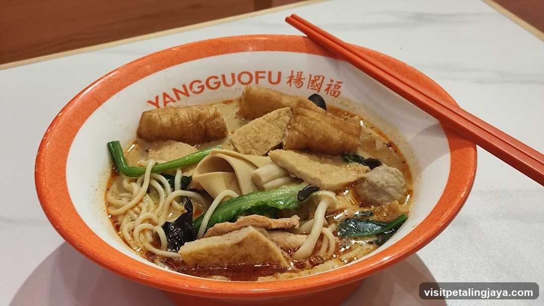 Bowl of noodles with tofu and vegetables