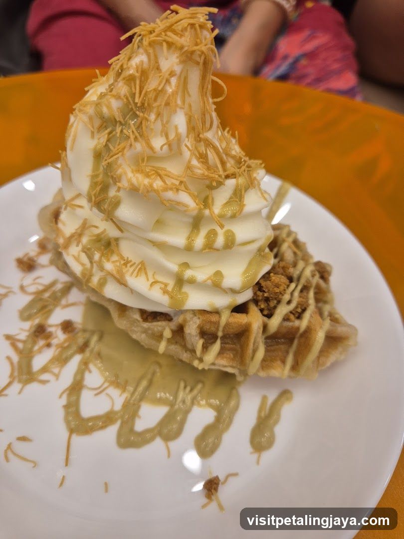 Waffle Dessert with Whipped Cream and Syrup