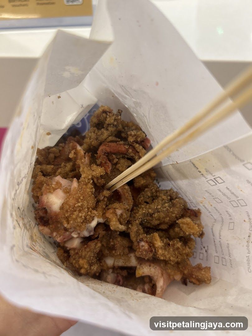 Food in paper bag with chopsticks