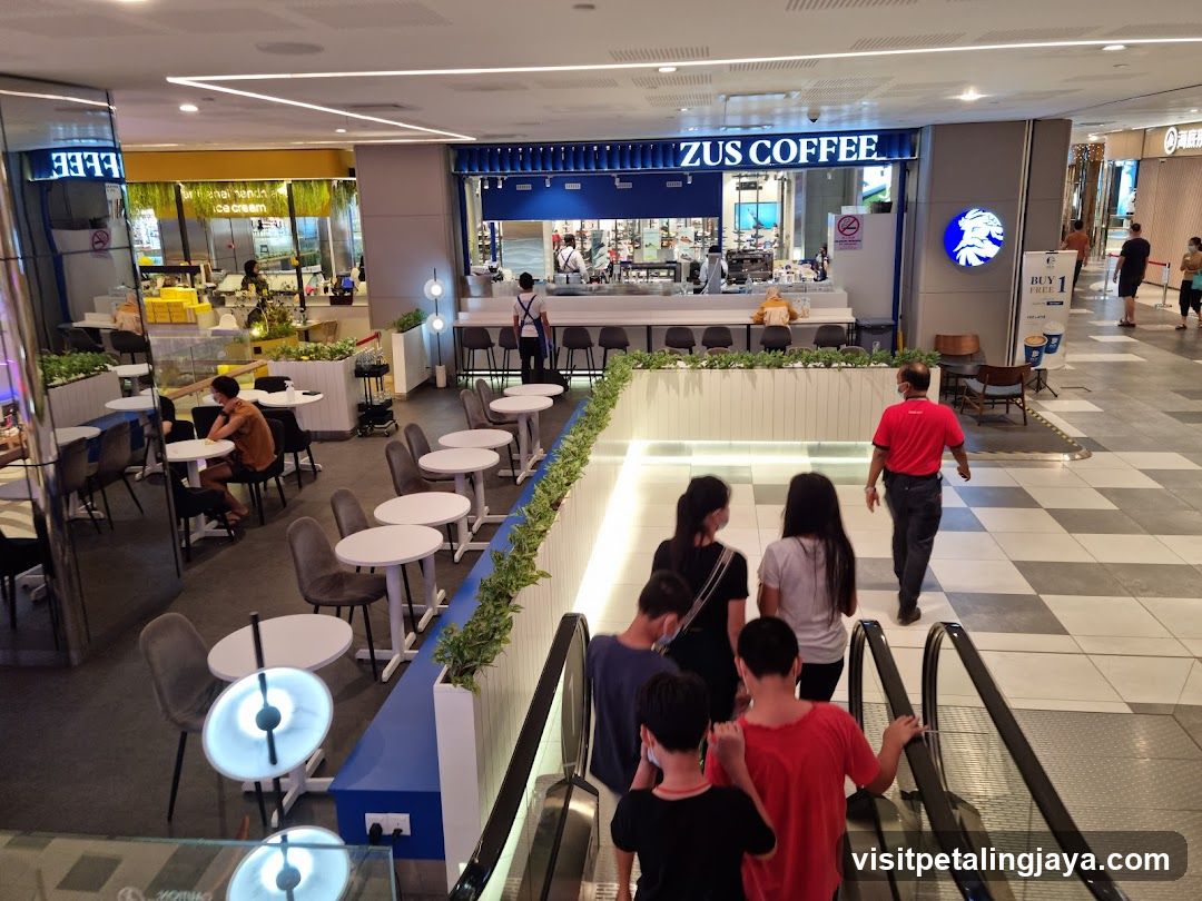 Shopping Mall Interior with Coffee Shop and Seating Area