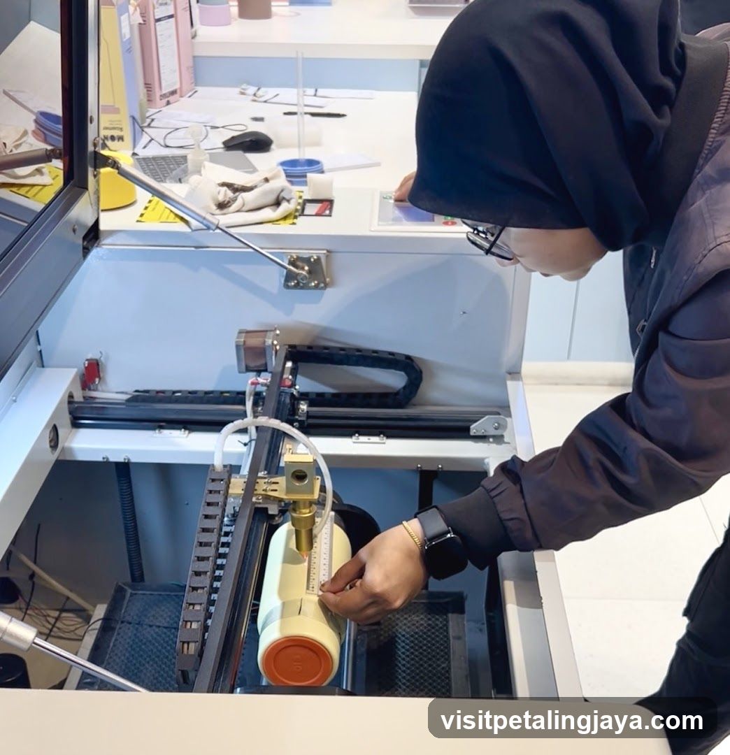 Person operating laser engraving machine