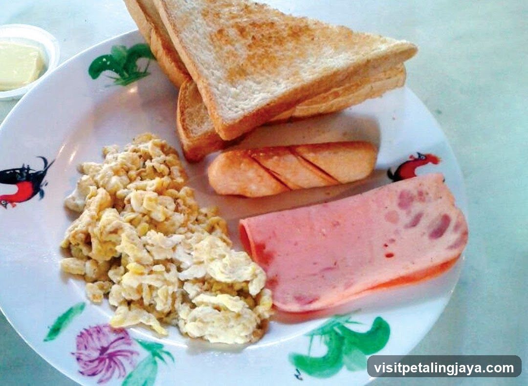 Breakfast Plate with Toast, Eggs, Sausage and Ham