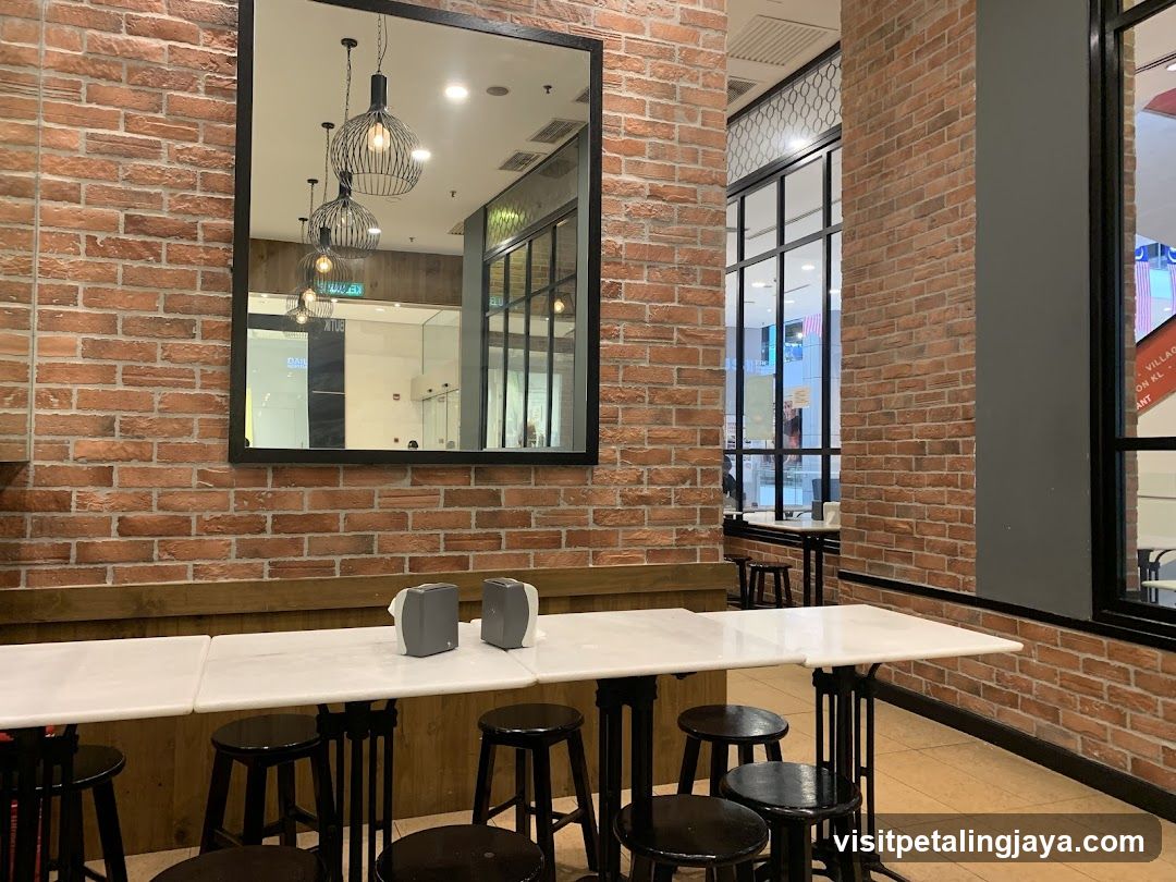 Brick Wall Interior with Mirrored Table Setting