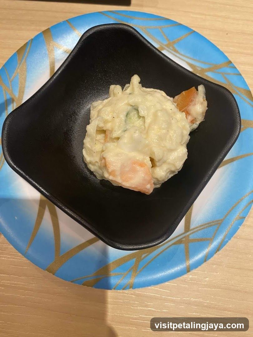 Creamy Salad in Black Bowl