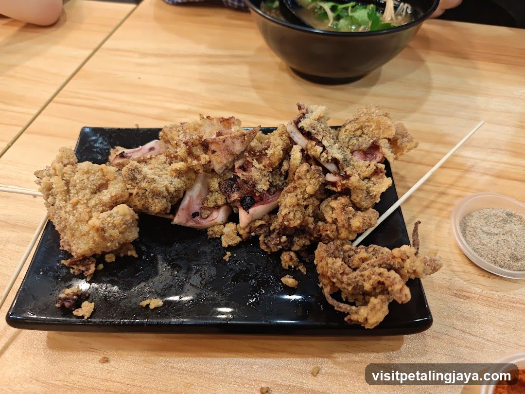 Fried Squid on Black Plate