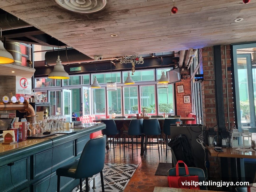 Interior of a bar or restaurant with exposed brick and wooden ceiling