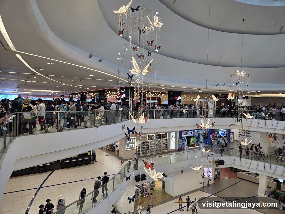 Shopping Mall Interior with Hanging Art Installations