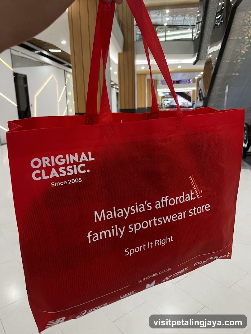 Red Shopping Bag with Sportswear Store Text