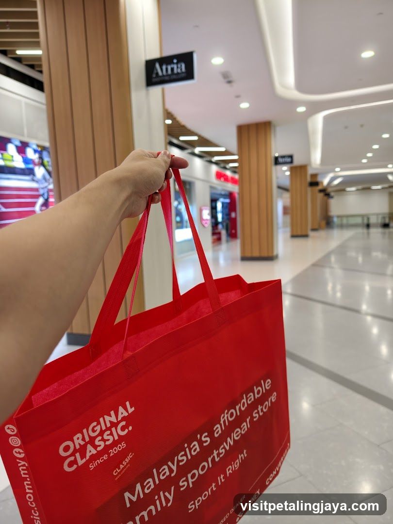 Red shopping bag in mall corridor