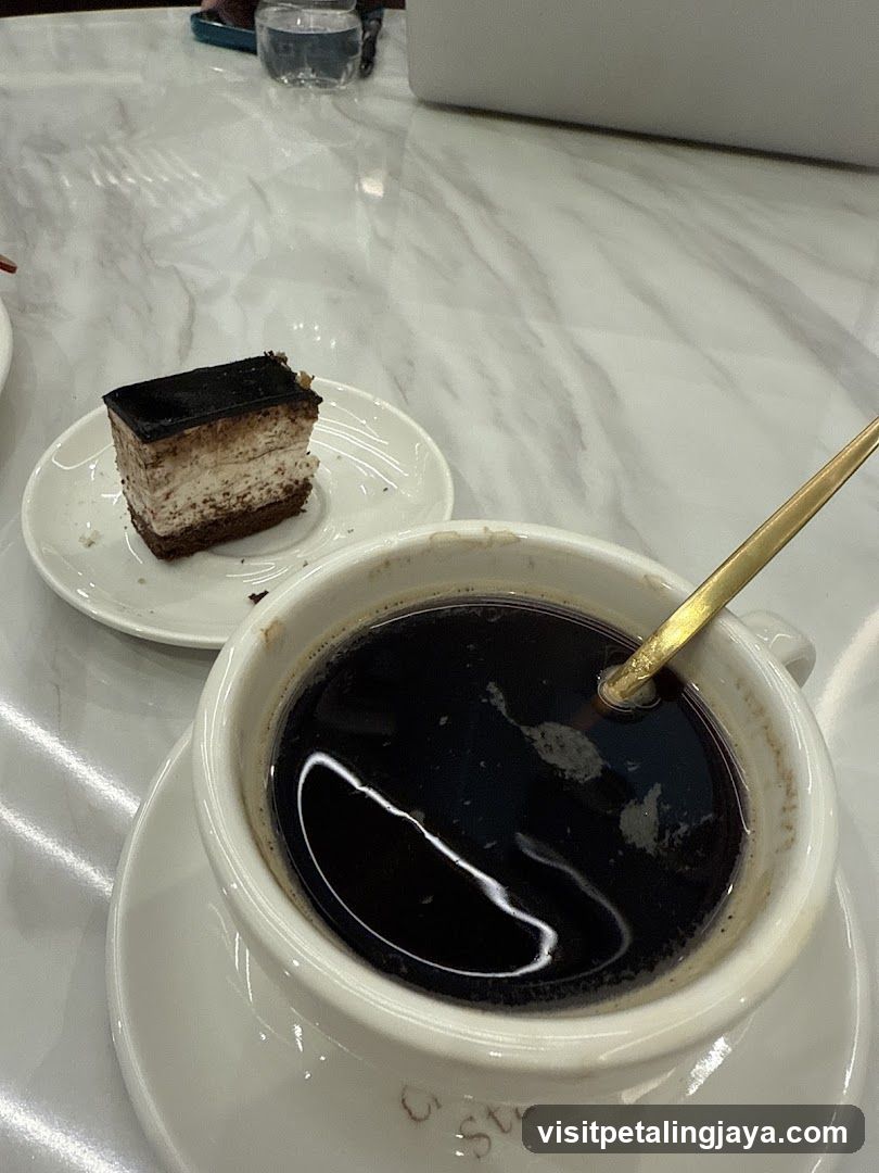 Coffee and Cake on Marble Table
