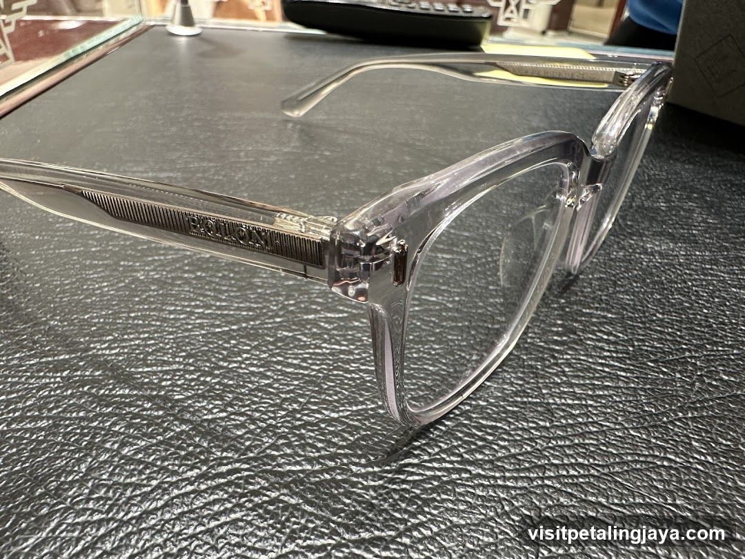 Clear Eyeglasses on Leather Surface