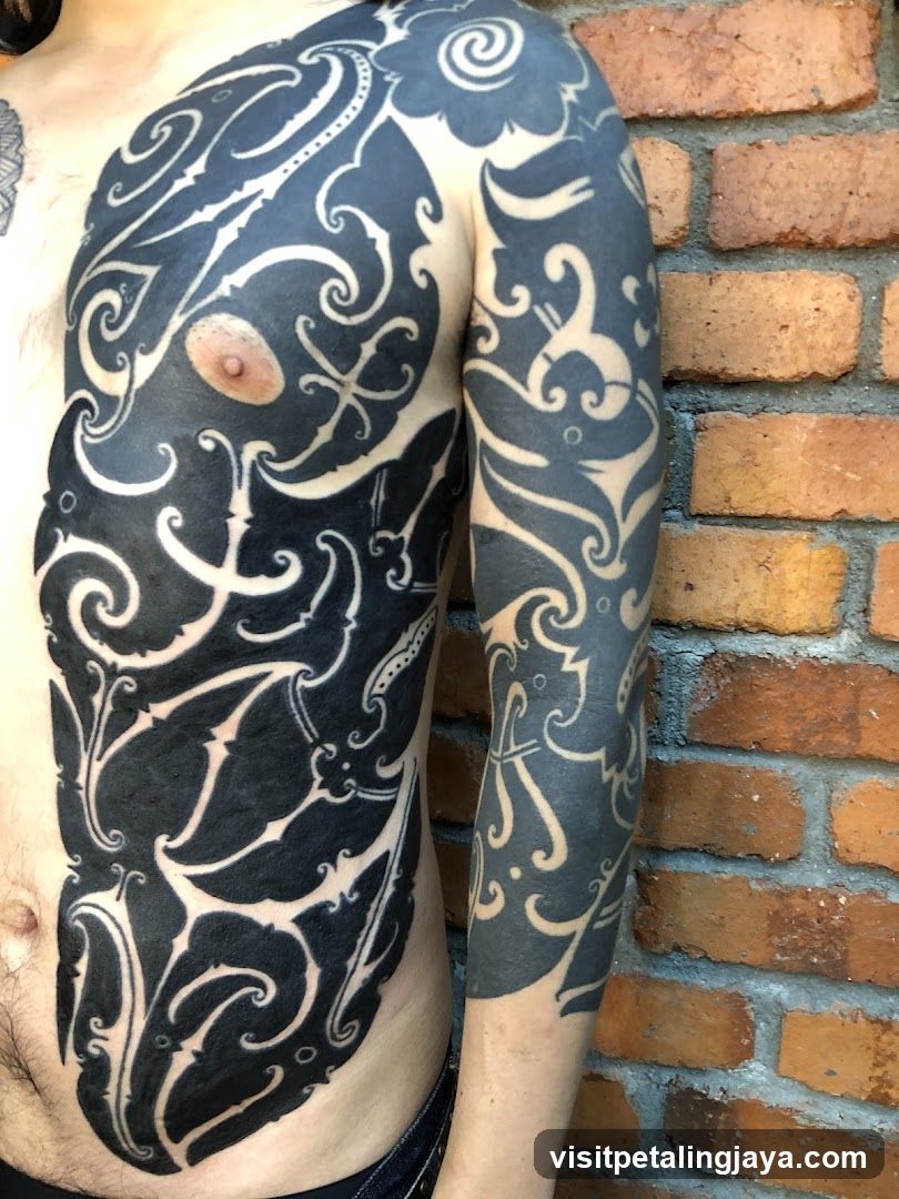 Tattooed Chest and Arm