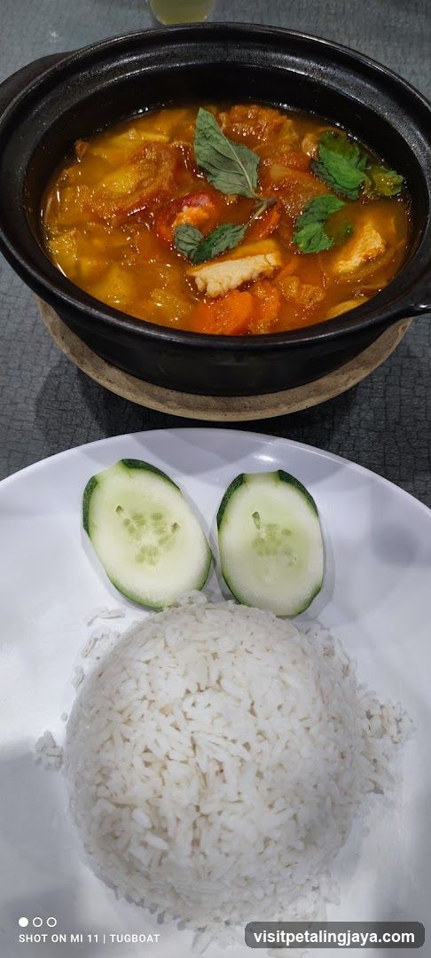 Curry Dish with Rice and Cucumber