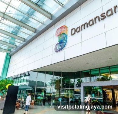Exterior view of Damansara mall entrance with visible signage and glass facade.