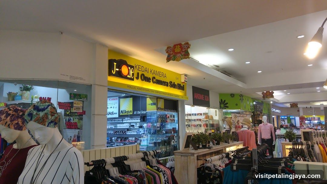 Shopping Mall Interior with Storefronts