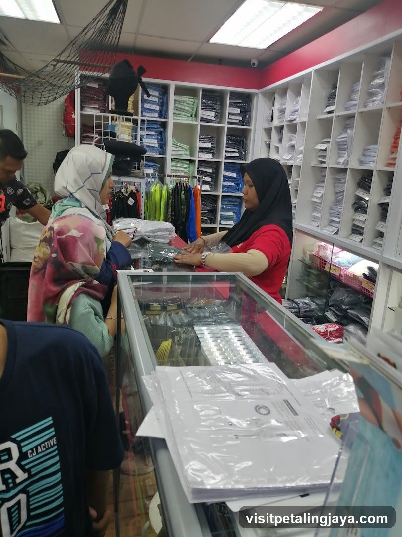 Interior of a retail shop with customers and staff
