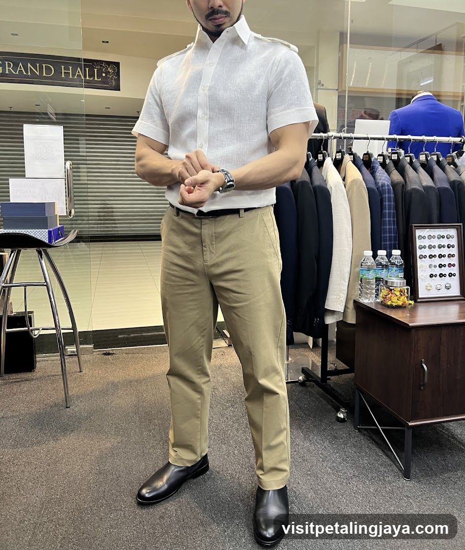 Man in Linen Shirt and Khaki Trousers