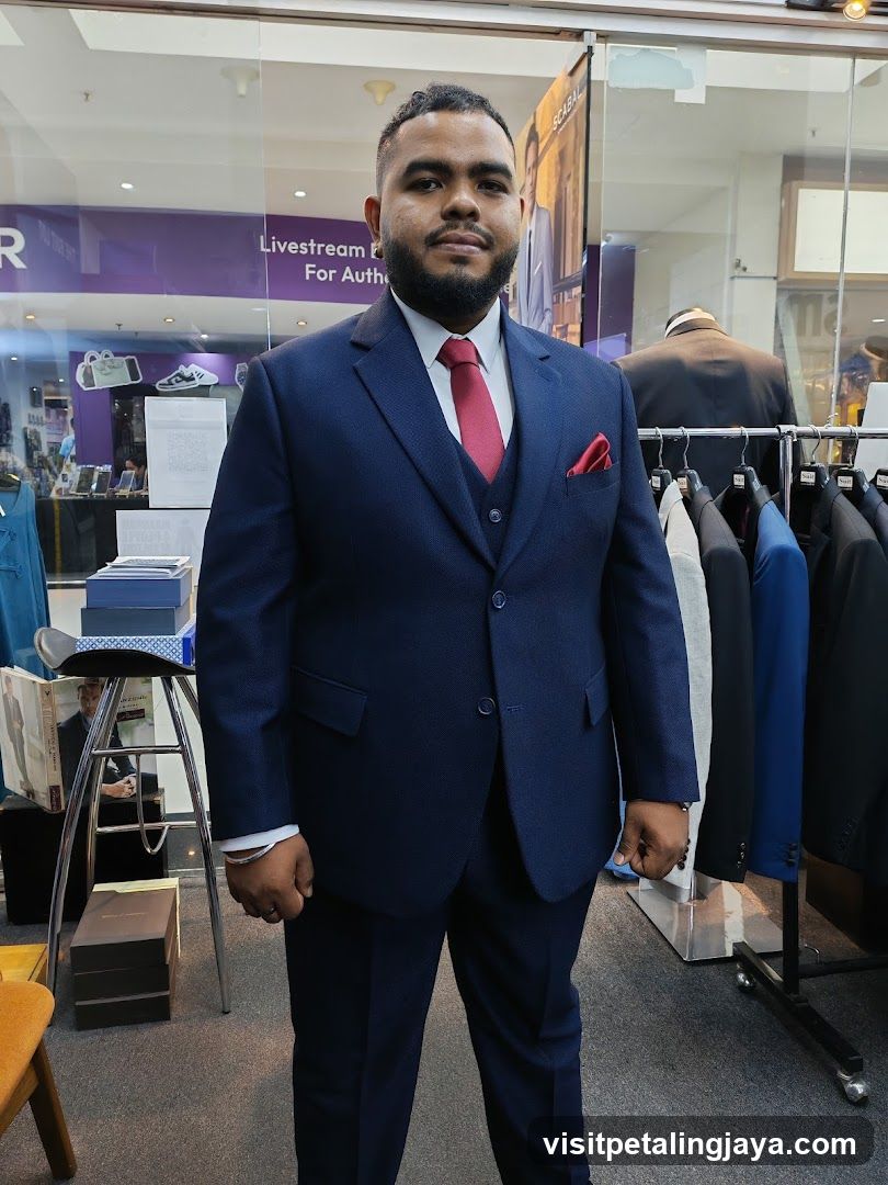 Man in Navy Suit at Clothing Store