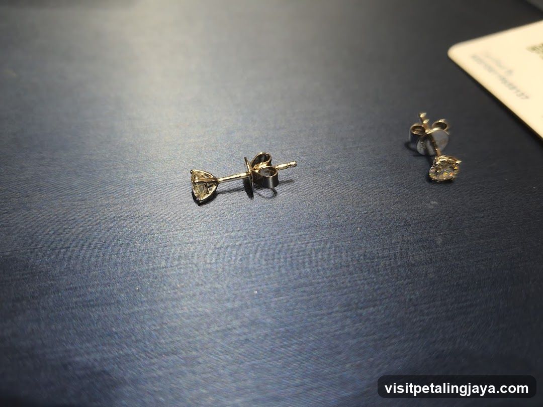 Earrings on a dark surface