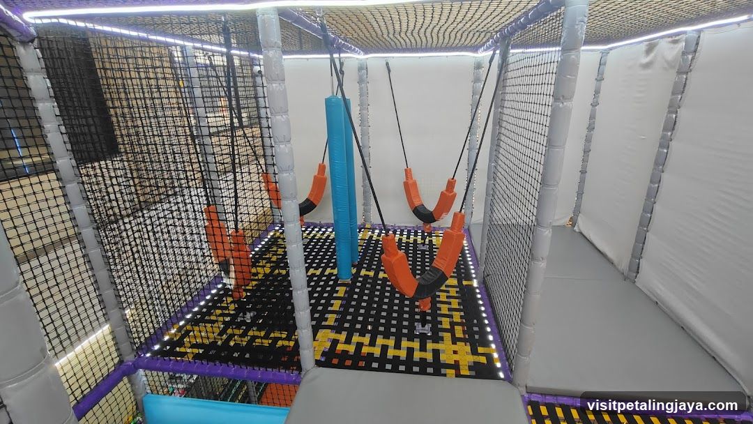 Indoor Play Area with Trampoline and Swings