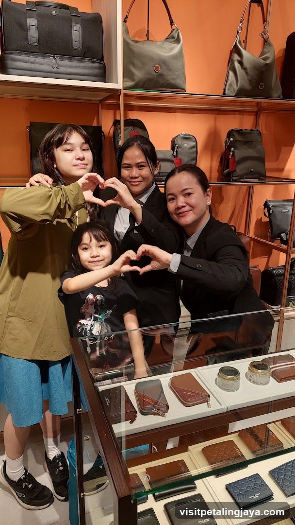 Family and Staff in Store