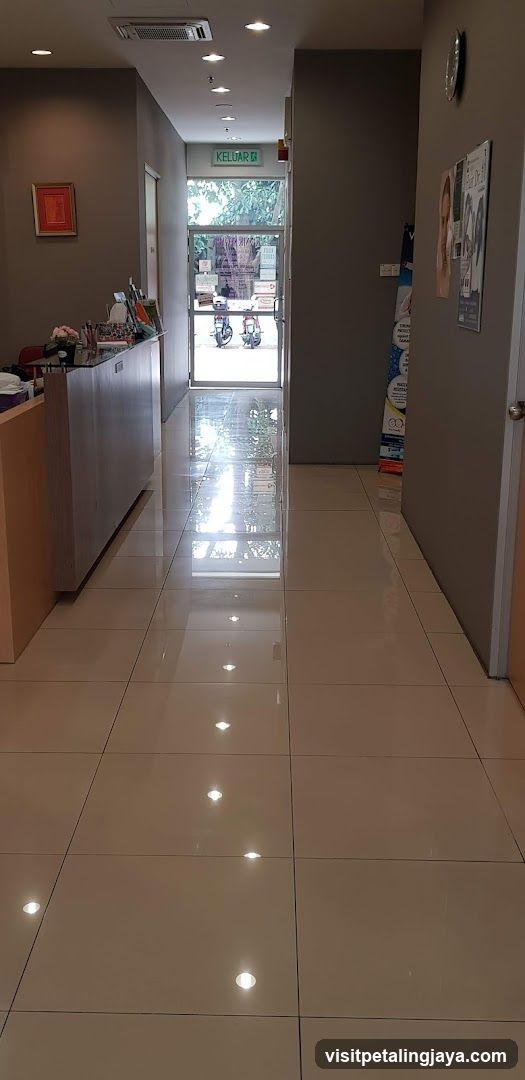 Interior Hallway with Reception Desk and Exit Sign