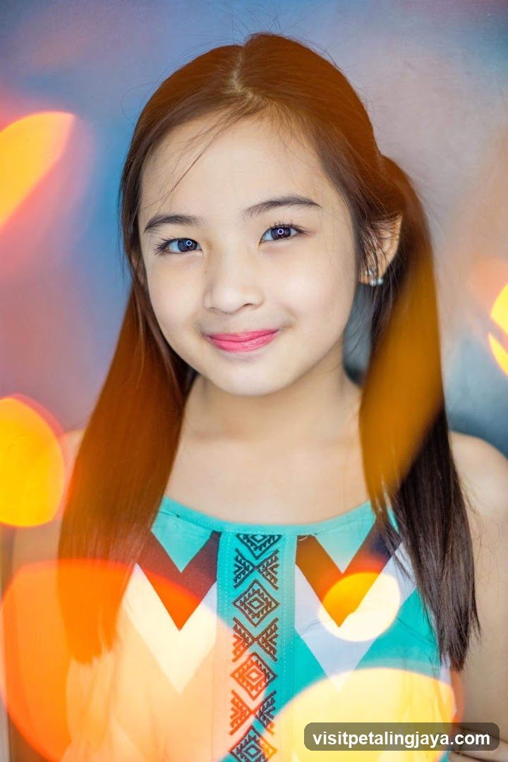 Portrait of a young girl with colorful bokeh background