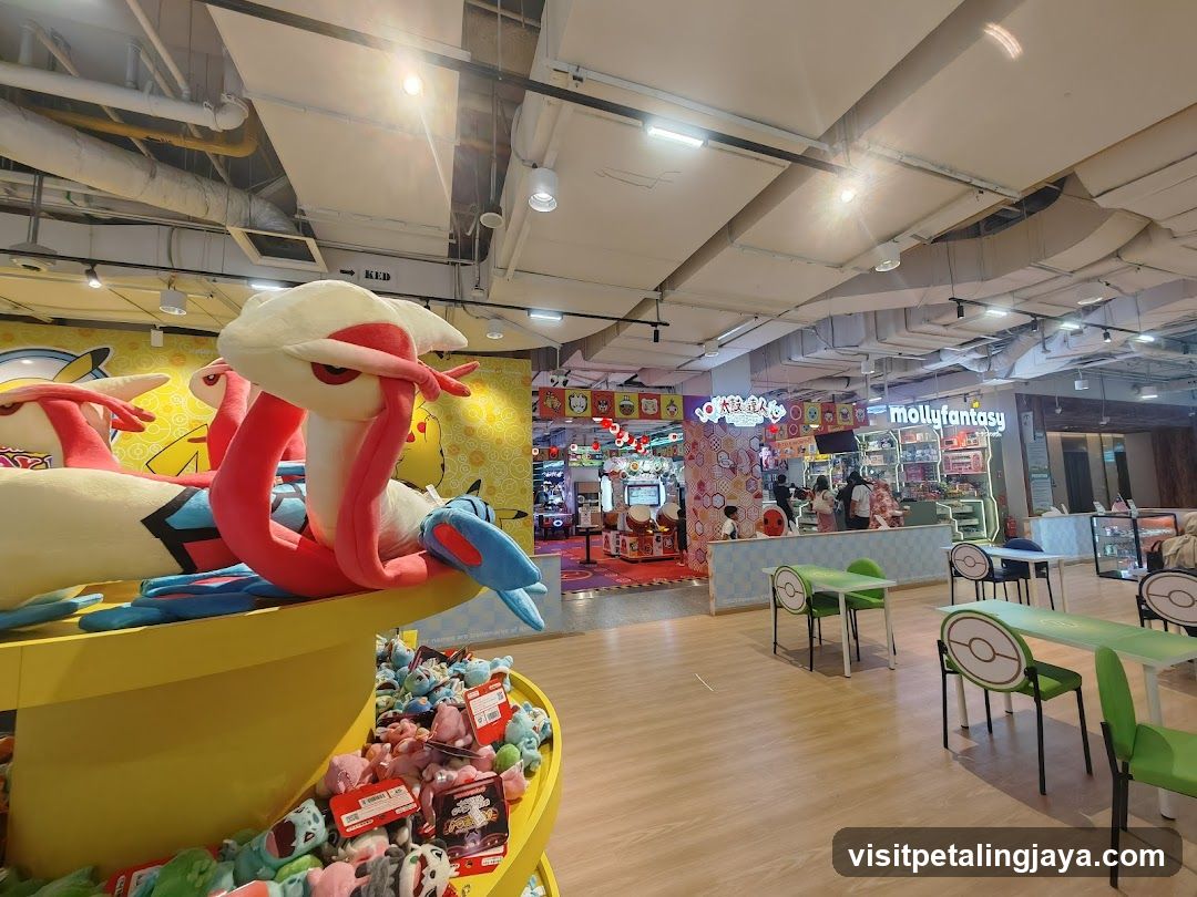 Pokémon-themed indoor space with merchandise and seating area