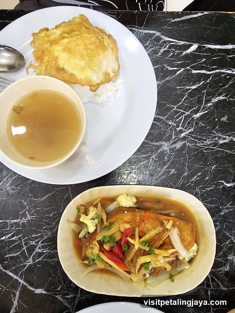 Thai Meal with Fried Egg and Stew