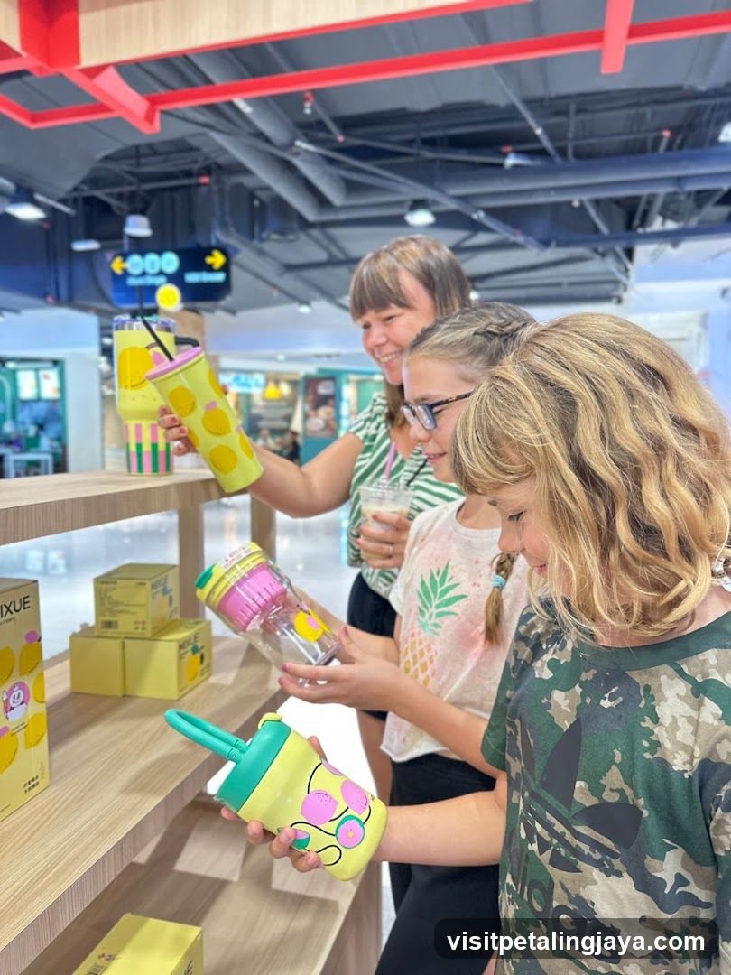Children examining colorful water bottles in a store