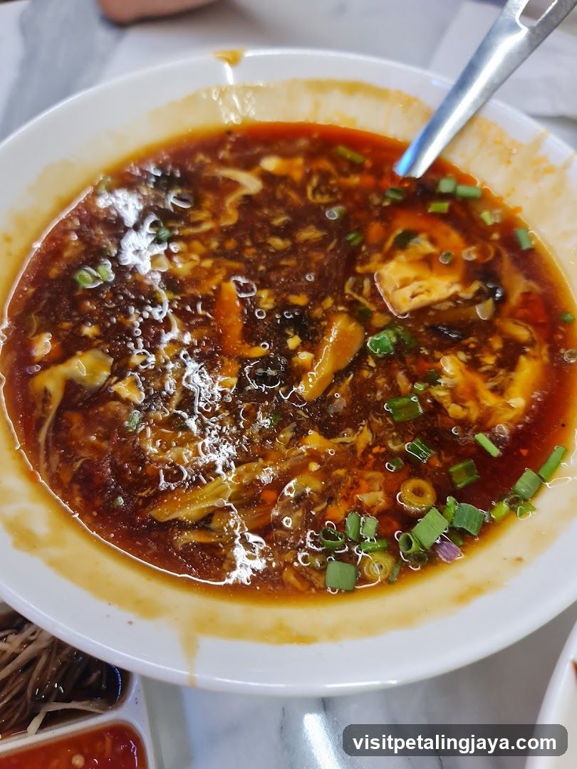 Spicy Soup with Egg and Green Onions