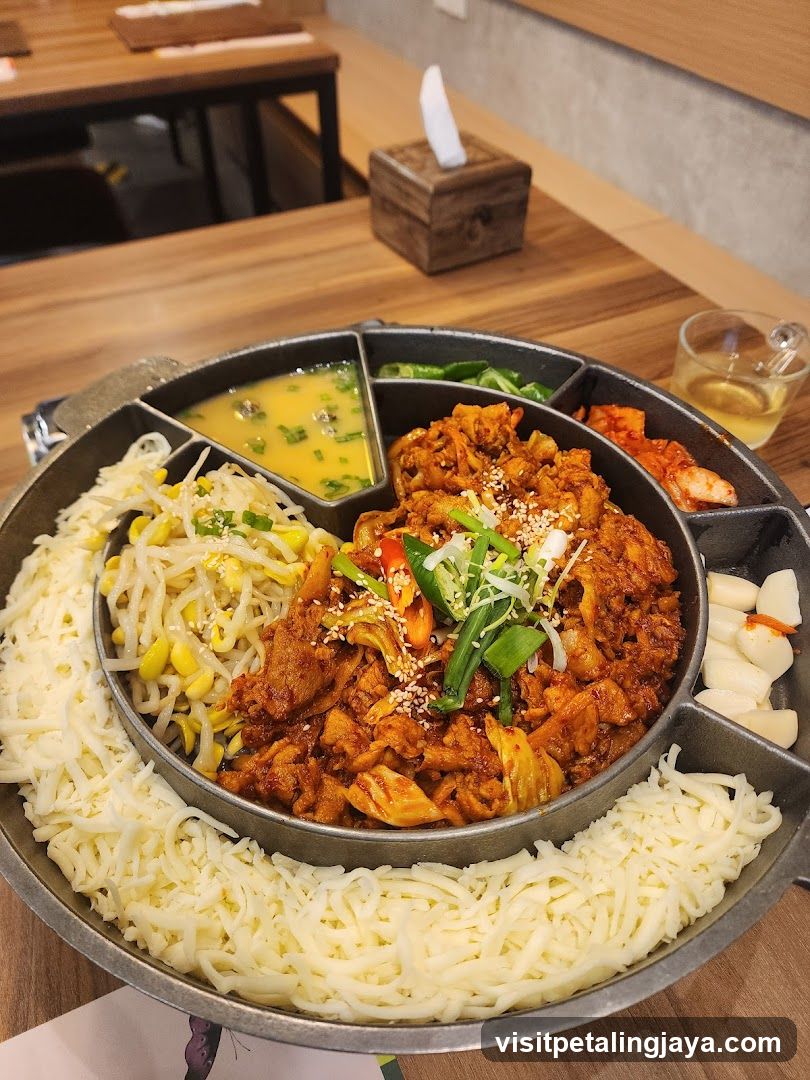 Korean BBQ Meal with Cheese and Side Dishes