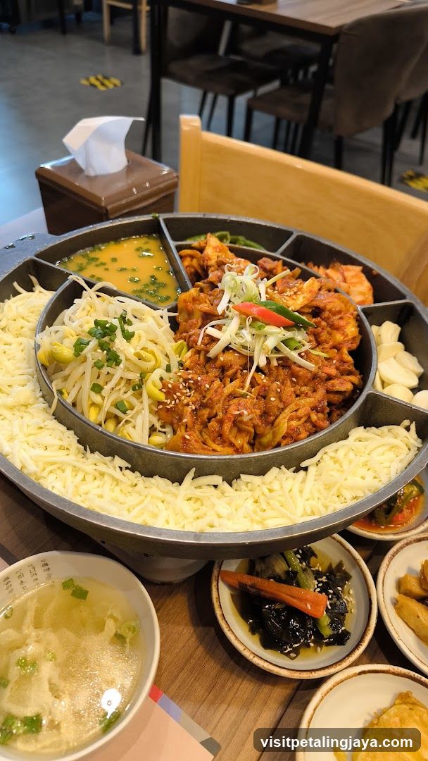 Korean BBQ Meal with Cheese and Side Dishes