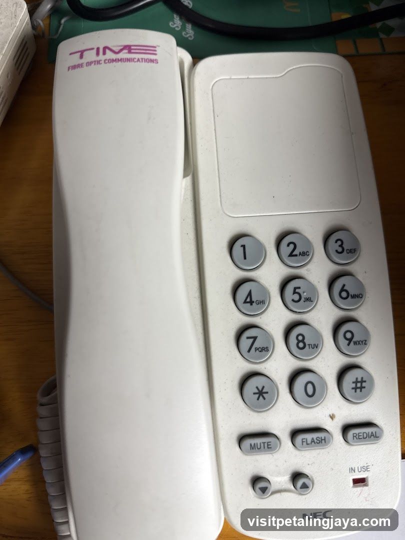 NEC Telephone on Wooden Surface