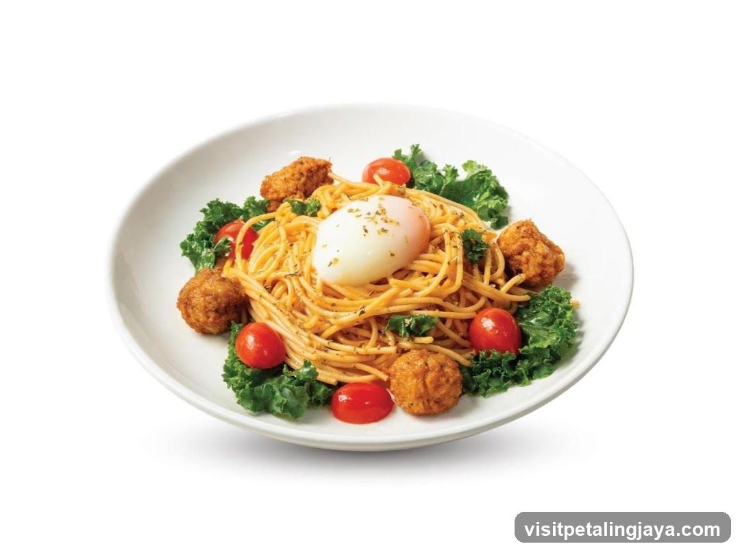 Spaghetti with Poached Egg and Meatballs