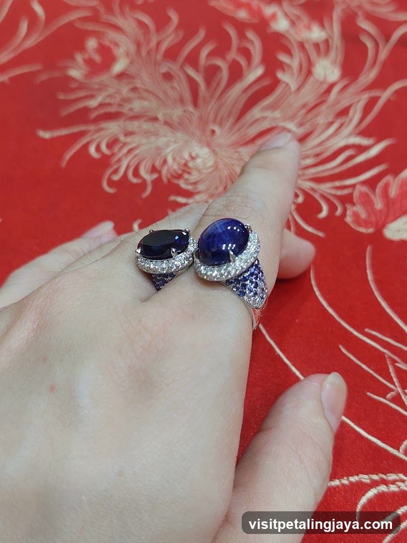 Sapphire and Diamond Rings on Finger